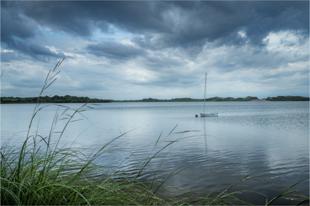 Main image Lonely Boat on Sachem Pond